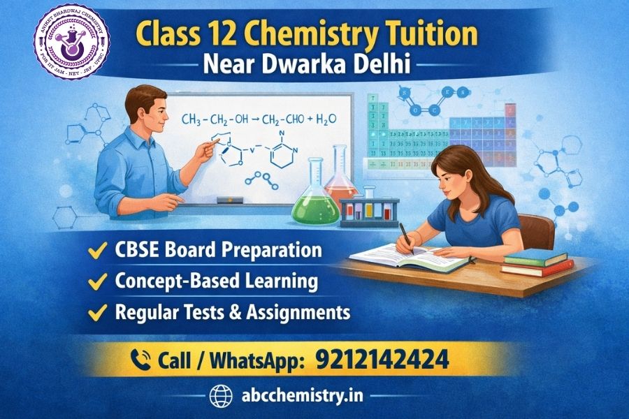 Laboratory glassware, molecular model spheres, and an open chemistry textbook on a study table